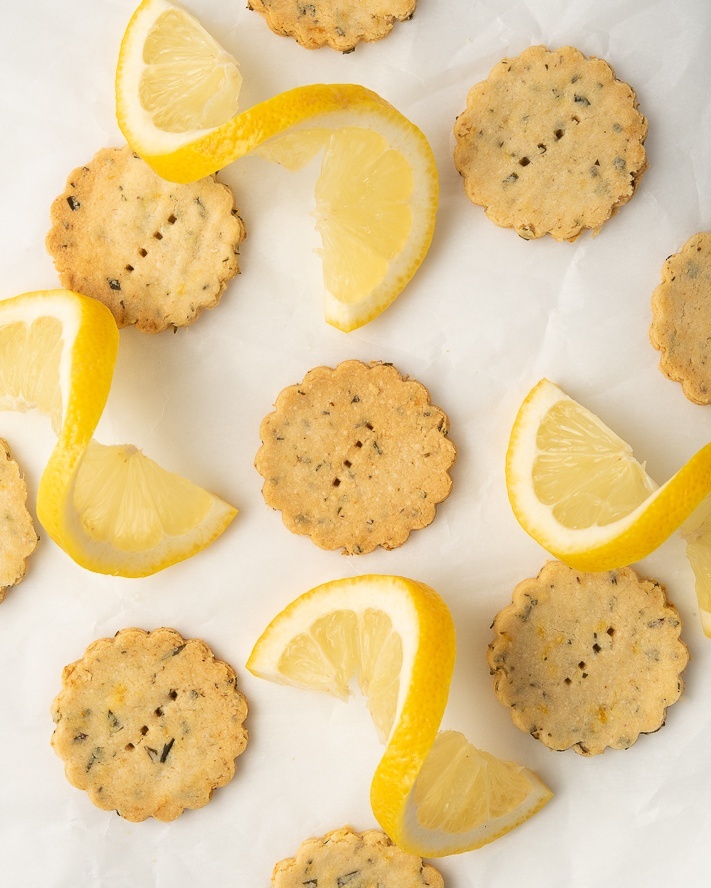 🍋 𝗟𝗲𝗺𝗼𝗻 𝗧𝗮𝗿𝗿𝗮𝗴𝗼𝗻 𝗖𝗿𝗮𝗰𝗸𝗲𝗿𝘀 will satisfy your desire to nosh - with zing!  If you are scared to try baking on the AIP, crackers are a great way to try something that is almost guaranteed to be successful.⁣
⁣
🍋 These fun crackers are surprisingly flavorful.  Definitely not boring!  The recipe lives in 𝗧𝗵𝗲 𝗔𝘂𝘁𝗼𝗶𝗺𝗺𝘂𝗻𝗲 𝗣𝗿𝗼𝘁𝗼𝗰𝗼𝗹 𝗕𝗮𝗸𝗶𝗻𝗴 𝗕𝗼𝗼𝗸, which is ready NOW for pre-order on Amazon!  Woo hoooooooo! 🙌🏻⁣
⁣
🍋 Oh.  A funny story about this photo.  On the day I shot it, a friend came over and had a cup of tea.  I had these lemon slices leftover from the shoot, so I offered her one for her tea.  Unfortunately, I forgot that I had sprinkled some salt flakes on that there parchment paper, and.... well, you can guess what happened!  The salt transferred to the lemon slices!  My friend was trying so hard to be polite, but her tea tasted like the ocean!  Oh friend, if you are reading this, I am SO sorry!!! 🙈  Yep, when your friend is a cookbook author, this is the kind of thing that can happen! 😆⁣
⁣
🍋 I would be honored if you'd go give my book baby a looksee.  Click on the link in my bio, and look for the blue button at the top. ⁣
⁣
🍋...and keep the salt out of your tea...⁣
🍋😀🍋